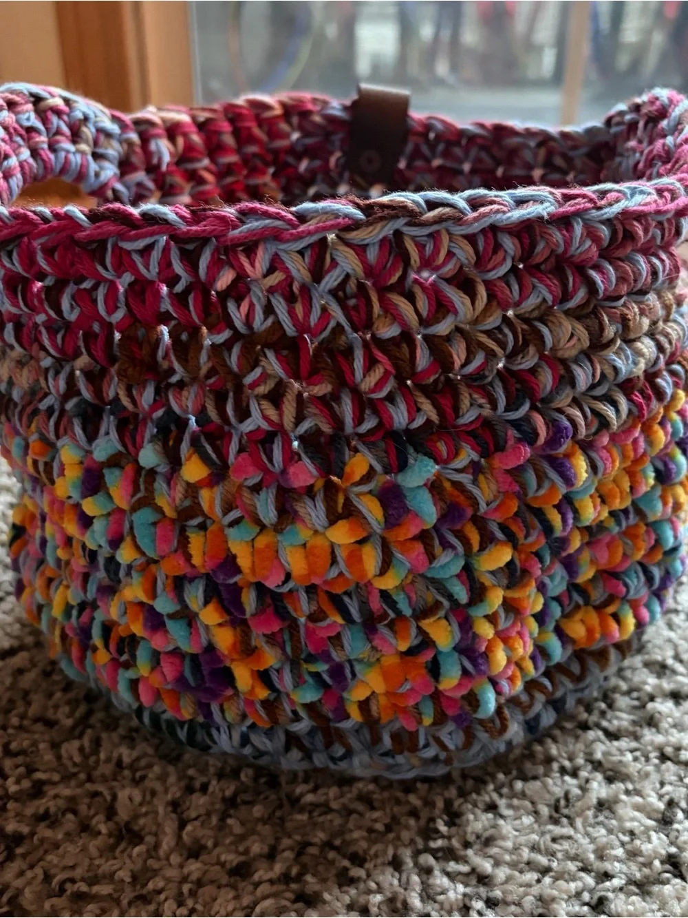 Multicolored crochet scrap basket perfect for storage